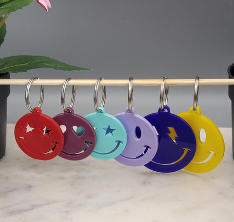 Smiley Face, Happy Face keychain made from  Acrylic. 3 Sizes, 4 designs Many colours to choose from.Perfect Gift for Your BFF bag charm